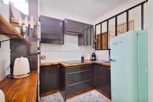 Appartements Appartement avec balcon proche Paris & transports : photos des chambres