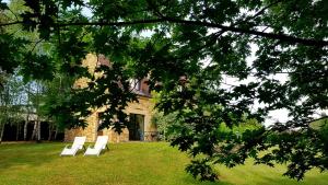 Les Granges Hautes, maisons de vacances, proches de Sarlat avec piscine, parc, : photos des chambres