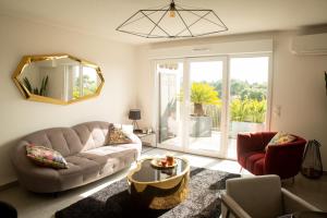 Appartements Le rooftop - jacuzzi et climatisation : photos des chambres