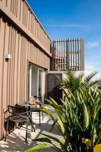 Appartements Le rooftop - jacuzzi et climatisation : photos des chambres