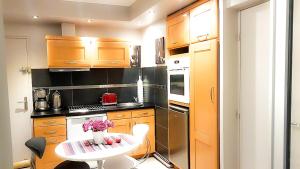 Appartements Cosy appartement proche centre, balcon, parking : photos des chambres