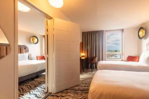 Hotels DoubleTree by Hilton Lyon Eurexpo & Spa : photos des chambres