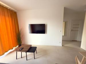 Apartament Diuna z dostępem do basenu, siłowni, hali sportowej, sauny