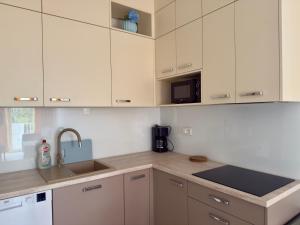 Apartament Diuna z dostępem do basenu, siłowni, hali sportowej, sauny