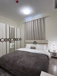 Two Bedroom Apartment Family Friendly with Balcony And Cozy Living Area - Al Qaia