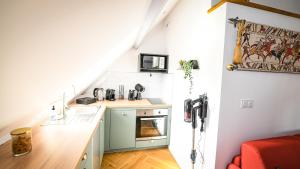 Appartements Le repaire du Conquerant : photos des chambres