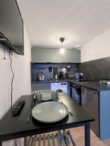 Appartements Studio hypercentre de Roanne - 10 train station : photos des chambres