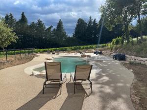 Chalets Chalet tous confort avec piscine lagon : photos des chambres