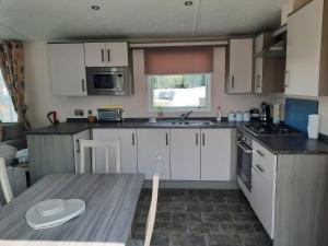 Luxury 6 berth caravan with large decking