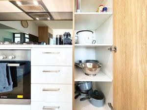 Beautiful Cambodian Inspired Apartment with Pool & Gym