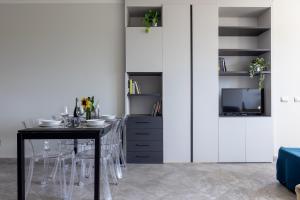Elegant Seaside Apartment with Pool and Parking