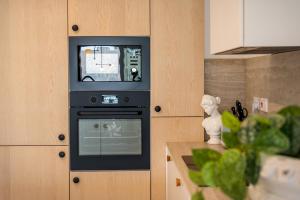 2br luxury penthouse and apartment, each with a terrace, private pool and Valletta views