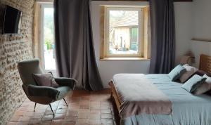 B&B / Chambres d'hotes La Coquille, chambre douillette aupres d-un elevage d-escargots : photos des chambres