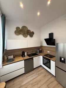 Grand F2 centre-ville, parking privée