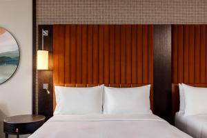 Two Queen Bed Junior Suite room in Hilton Vienna Danube Waterfront