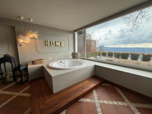 Suite mit Seeblick und eigenem Garten