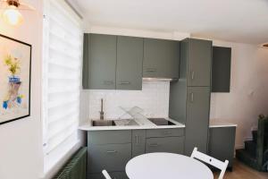 Maisons de vacances Charmante maisonnette a 2 pas de la plage ! : photos des chambres