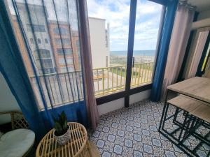 Appartements Magnifique vue plage a 50m, WIFI, tres joli et moderne appt 1 chambre, 4 couchages 2 adultes 2 enfants : photos des chambres