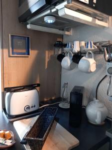 Appartements Pied a terre, sejour idyllique face a la mer classe 2 etoiles : photos des chambres