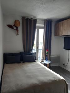 Appartements Pied a terre, sejour idyllique face a la mer classe 2 etoiles : photos des chambres