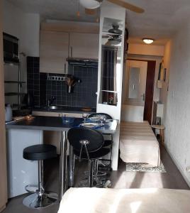 Appartements Pied a terre, sejour idyllique face a la mer classe 2 etoiles : photos des chambres