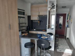 Appartements Pied a terre, sejour idyllique face a la mer classe 2 etoiles : photos des chambres