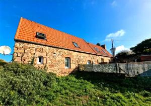 Maisons de vacances Coeur de granit rose, meuble alliant le charme de l-authentique breton et du confort, classe 3 etoiles, a 5mn de 13 plages de la reputee cote de granit rose : photos des chambres