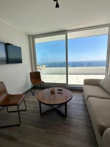 Depto privado con vista despejada al mar en 1 línea, terraza 20 mts y estacionamiento con acceso desde el borde costero