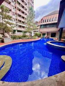 Prime Studio Unit at Robinson Magnolia 5 mins Walk to Mall-Netflix-KTV-WiFi