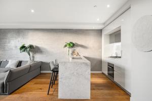 Beachside Gem with Gorgeous Views & Cafes Steps Away!