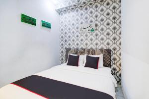 Hotel O Jalan Jenderal Sudirman Near Imam Bonjol Square Formerly Nelvi Guest House