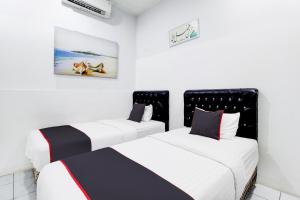 Hotel O Jalan Jenderal Sudirman Near Imam Bonjol Square Formerly Nelvi Guest House