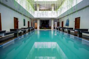 Capital O 293 Mutiara Hijau Suites Syariah