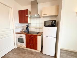 Appartements Le Rayonnant, Lumineux, Centre-ville : photos des chambres