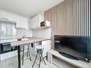 Appartements T2 ideal pour concerts, matchs & salons a Lyon ! : photos des chambres