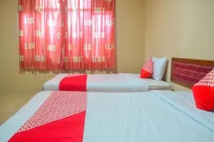 Super OYO 1240 Hotel Pantai Jaya - Rejamulya