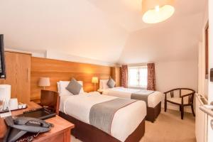 Standard Twin Room room in OYO Flagship The Regency