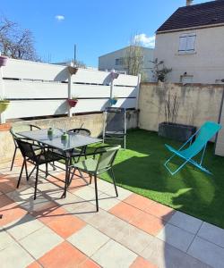 Appartements Le Jardin Ati : photos des chambres