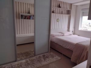 Apto vista magnífica condomínio familiar Floripa