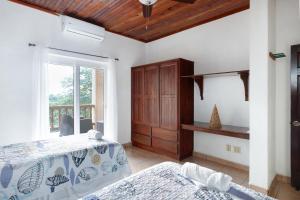 Tropical Sunset at Sunset Villas in West End