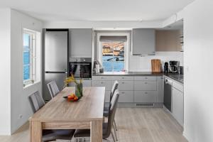 Komfortable Ferieleiligheter med Sjøutsikt