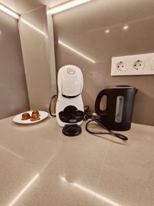 Claudia Luxury Apartment near the beach with a pool, gym, and secure gated parking