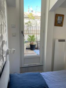 Appartements Appartement avec terrasse : photos des chambres