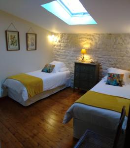 Maisons de vacances Le Gite de l'aubray, gite avec piscine : photos des chambres