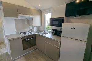 Chalets Beautiful 3-bedroom mobil home - near the beach : photos des chambres