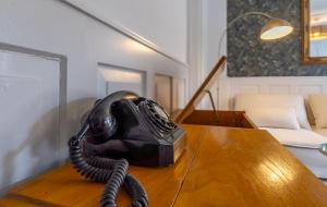 Boho Suite Zürich - 80 qm, 3 Schlafzimmer, Balkon & Zugang zur Dachterrasse mit Grill & Seesicht