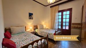 Family-friendly apartment in a village house 25 km and 30 mins away from Thessaloniki