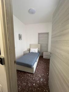 Camera Singola con Bagno in Comune