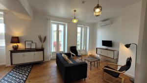 Appartements Le Gite de L-epicier : photos des chambres