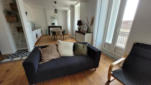 Appartements Le Gite de L-epicier : photos des chambres